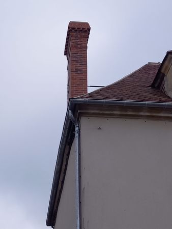 Remplacement d'une tête de cheminée